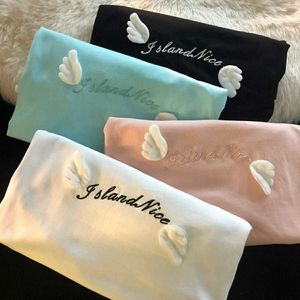 Sky blue angel wings top